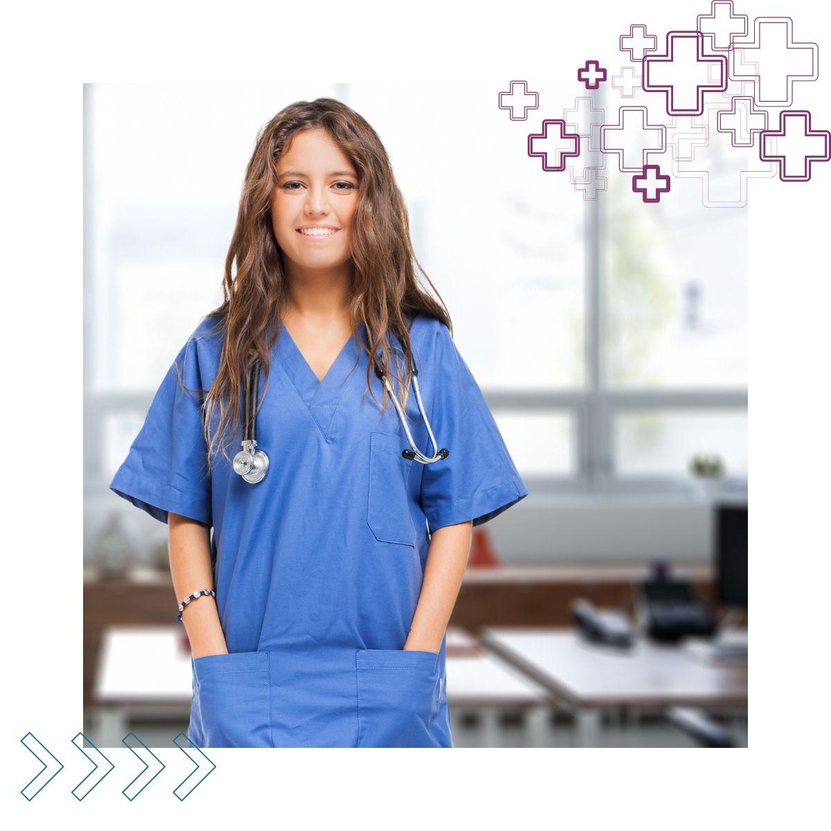 Image of a female doctor with long brown hair in scrubs with a stethoscope around her neck looking into the camera